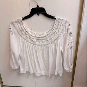 Boho looking casual comfortable blouse.  No stains in great condition.